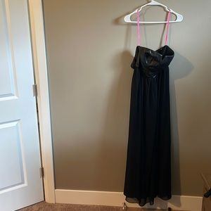 leather corset strapless top with chiffon bottom. Solid skirt under chiffon.